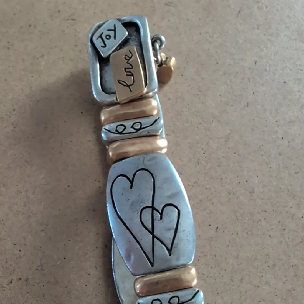 Silver and Gold Tone Heart with Red Crystals Stretch Bracelet
